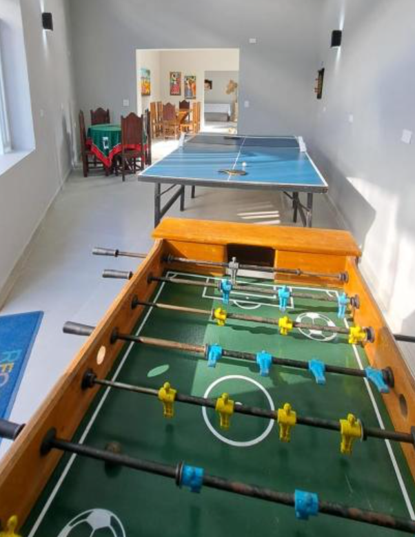 Recanto do Sol Bertioga hotel pet friendly com salão de jogos